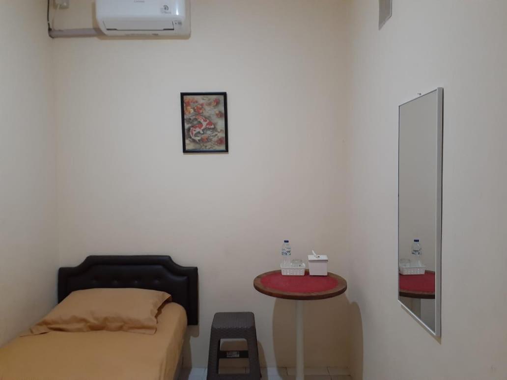 Отель Kost Carmelia Syariah Baranangsiang Богор Экстерьер фото