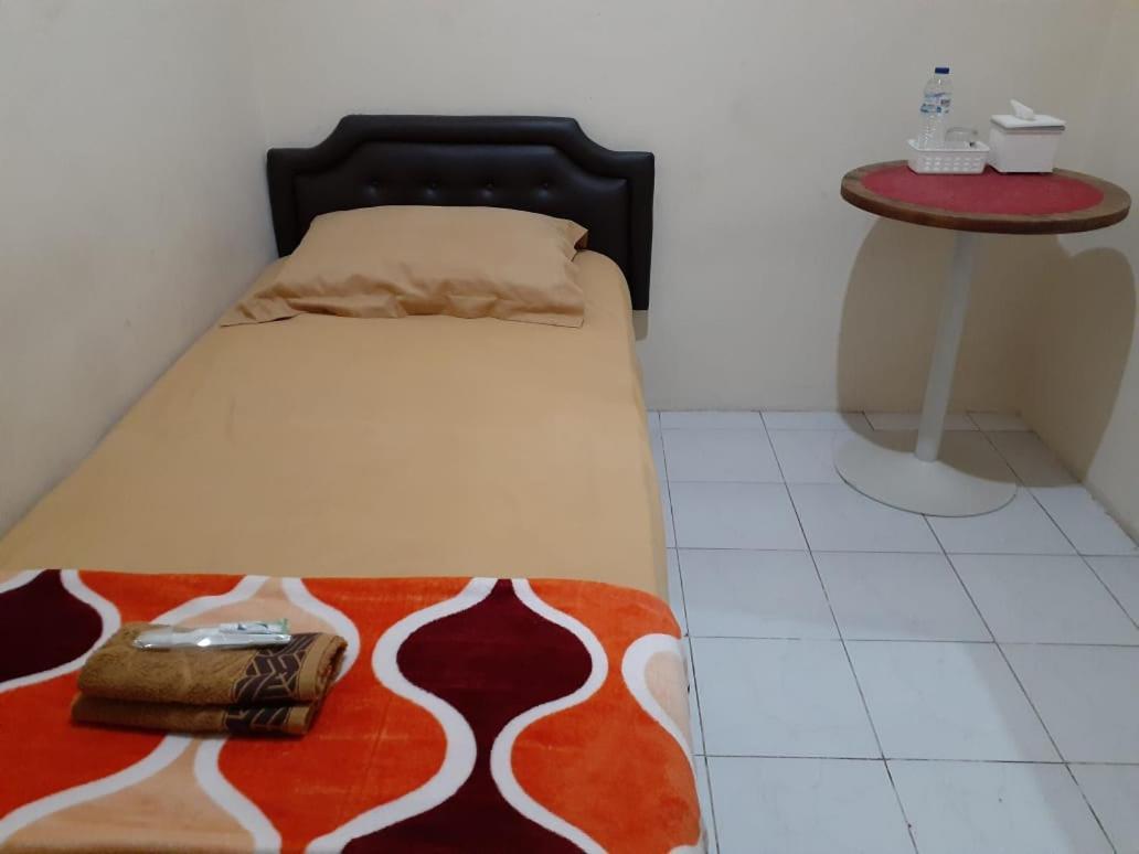 Отель Kost Carmelia Syariah Baranangsiang Богор Экстерьер фото