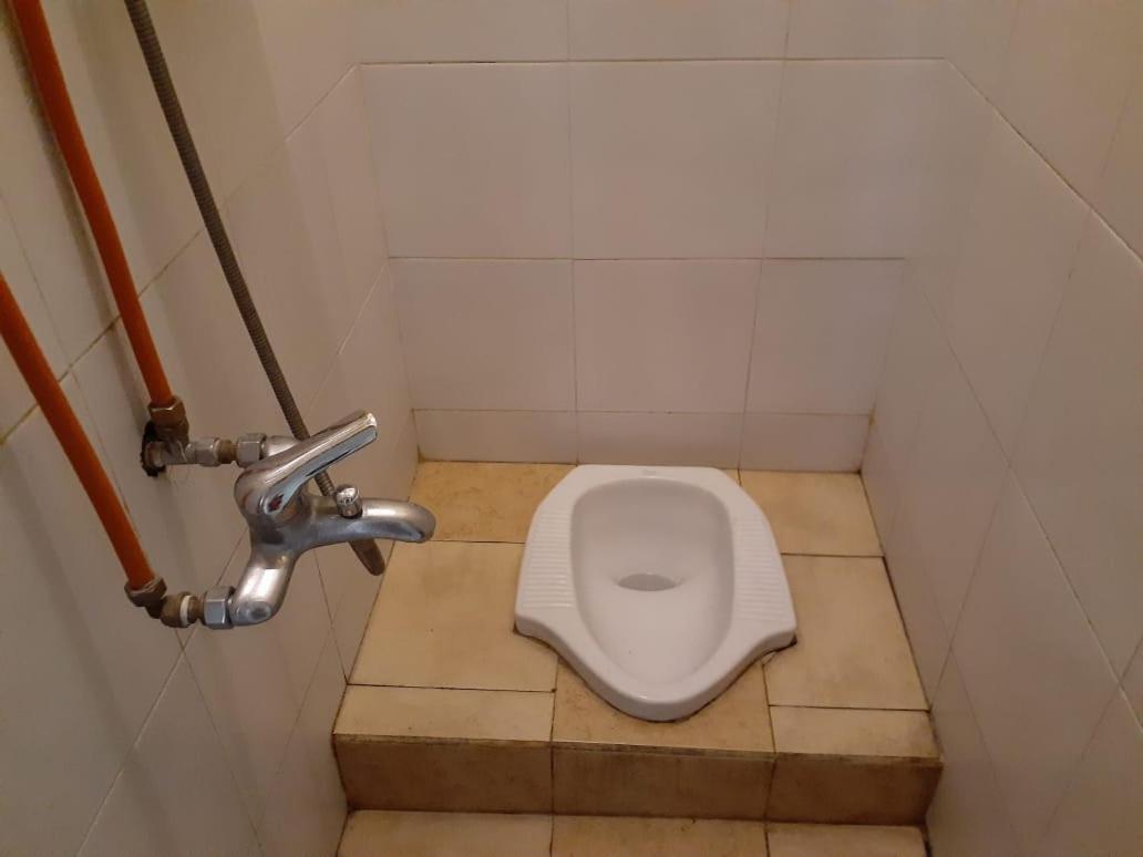 Отель Kost Carmelia Syariah Baranangsiang Богор Номер фото