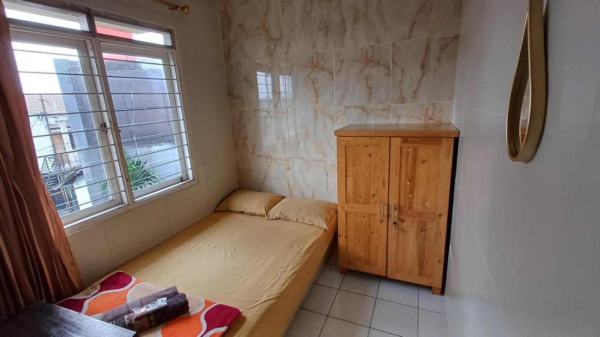 Отель Kost Carmelia Syariah Baranangsiang Богор Экстерьер фото
